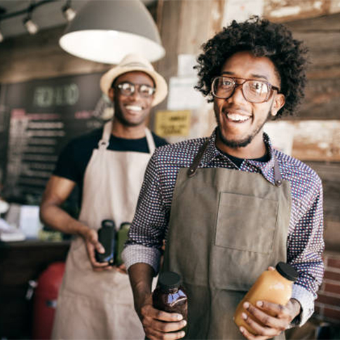 Owner of a local business standing in their shop