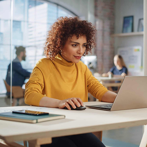 Owner of a local business standing in their shop